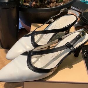 Whit and black trim heels